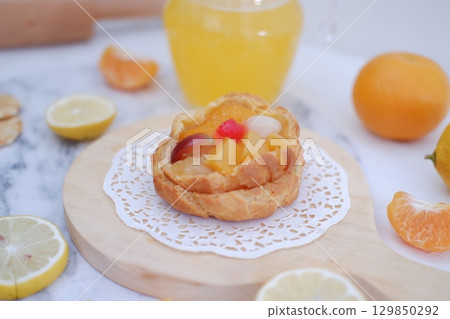 Tropical Fruit Dessert in Soft Pastel Setting Tropical Fruit Dessert in Soft Pastel Setting 129850292