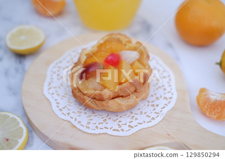 Tropical Fruit Dessert in Soft Pastel Setting Tropical Fruit Dessert in Soft Pastel Setting 129850294