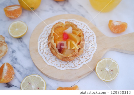 Tropical Fruit Dessert in Soft Pastel Setting Tropical Fruit Dessert in Soft Pastel Setting 129850313