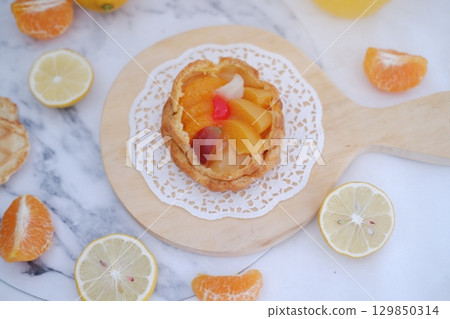 Tropical Fruit Dessert in Soft Pastel Setting Tropical Fruit Dessert in Soft Pastel Setting 129850314