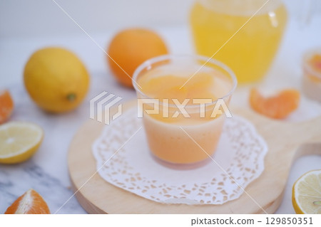 Tropical Fruit Dessert in Soft Pastel Setting Tropical Fruit Dessert in Soft Pastel Setting 129850351