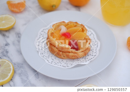 Tropical Fruit Dessert in Soft Pastel Setting 129850357