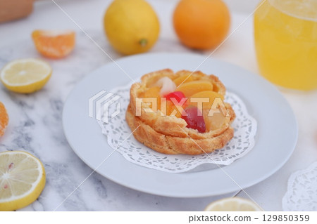 Tropical Fruit Dessert in Soft Pastel Setting Tropical Fruit Dessert in Soft Pastel Setting 129850359