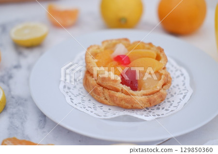 Tropical Fruit Dessert in Soft Pastel Setting Tropical Fruit Dessert in Soft Pastel Setting 129850360