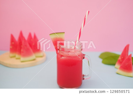 Summer Refreshment Watermelon Drink with Fruit Garnish 129850571