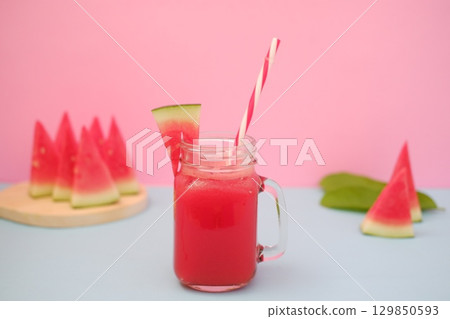 Summer Refreshment Watermelon Drink with Fruit Garnish Summer Refreshment Watermelon Drink with Fruit Garnish 129850593