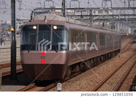 Odakyu 30000 series Romancecar EXE express train running on a continuous elevated track (photographed on 10/19/2009) 129851050