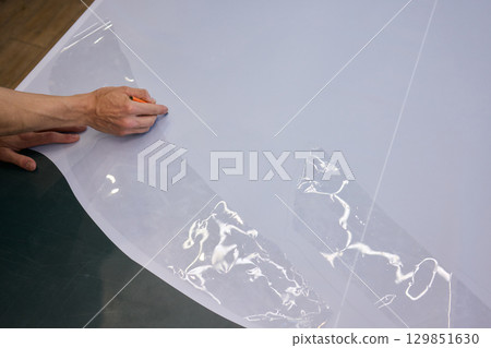 Measuring and accurately cutting paper for various creative craft projects effectively 129851630
