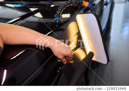 Expert Professional Car Dent Repair Services Utilizing Advanced Modern Tools and Techniques Expert Professional Car Dent Repair Services Utilizing Advanced Modern Tools and Techniques 129851649