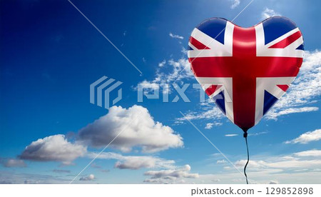 British flag heart shaped balloon and blue sky 129852898