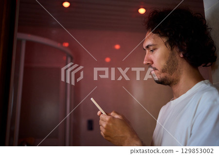 A Colorful Remote Control Set Against the Backdrop of a Dimly Lit Room Environment A Colorful Remote Control Set Against the Backdrop of a Dimly Lit Room Environment 129853002