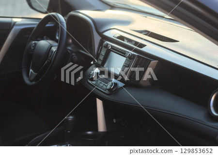 The Modern Car Control Panel boasts a sleek design and well placed buttons for luxury 129853652