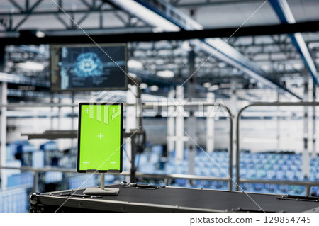 Green screen tablet in server farm with neural networks tech detecting data patterns. Chroma key notebook in data center with hardware built for artificial intelligence prediction models Green screen tablet in server farm with neural networks tech detecting data patterns. Chroma key notebook in data center with hardware built for artificial intelligence prediction models 129854745