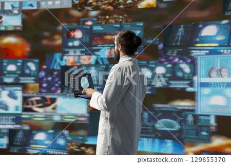 Medic expert uses tools and smart health systems to provide health solutions, showcasing scientific advancement in diagnostics and the future of healthcare through modern technology. Medic expert uses tools and smart health systems to provide health solutions, showcasing scientific advancement in diagnostics and the future of healthcare through modern technology. 129855370