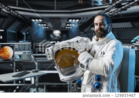 Portrait of cosmonaut preparing for mission on Mars, doing space colonization. Man in orbital station beginning landing procedures on red desert planet, mapping unknown worlds Portrait of cosmonaut preparing for mission on Mars, doing space colonization. Man in orbital station beginning landing procedures on red desert planet, mapping unknown worlds 129855487