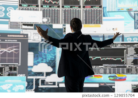 Proud confident CEO celebrating his career achievement with self belief, achieving greatness in the business industry. Motivated person building a high end life for himself, dream big. Proud confident CEO celebrating his career achievement with self belief, achieving greatness in the business industry. Motivated person building a high end life for himself, dream big. 129855704