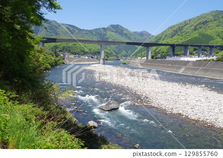 Fresh green scenery along the Ota River Fresh green scenery along the Ota River 129855760