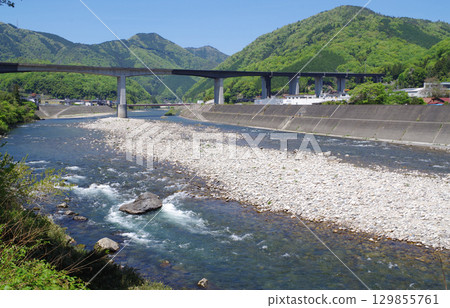 Fresh green scenery along the Ota River Fresh green scenery along the Ota River 129855761