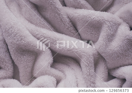 pink soft fluffy blanket textile 129856373