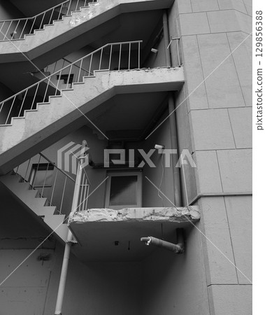 Back stairs of an old building 129856388