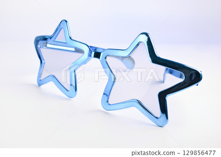 blue star shape of glasses on white background 129856477