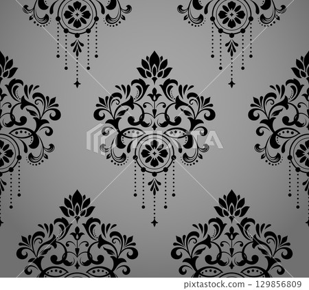 Wallpaper in the style of Baroque. Gray and black floral ornament. Seamless vector background. Graphic pattern for fabric, wallpaper, packaging. Ornate Damask flower illustration 129856809