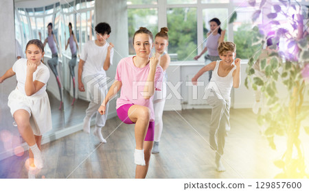 Group of boys and girls dancing dancehall 129857600