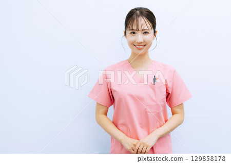 Smiling female nurse Smiling female nurse 129858178