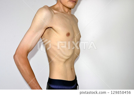 Thin male nude upper body facing left Thin male nude upper body facing left 129858456