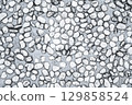 background with a sidewalk texture with white pebbles. Natural road surface 129858524