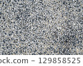 background with sidewalk texture with pebbles. Natural cement road surface 129858525