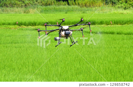 Pesticide spraying by drone 129858742