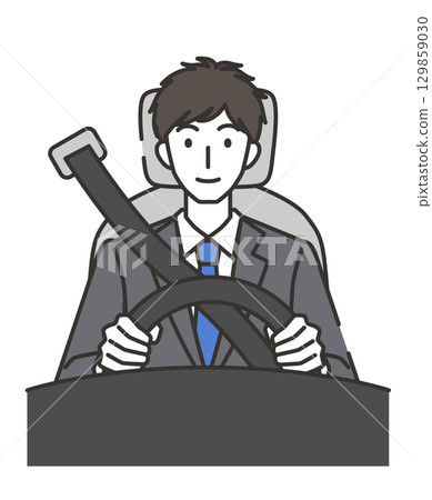 一個穿著西裝的男人開車 129859030