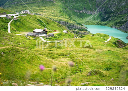 Idyllic Alpine Landscape with Turquoise Lake in Austria, Grossglockner High Alpine Road Idyllic Alpine Landscape with Turquoise Lake in Austria, Grossglockner High Alpine Road 129859824
