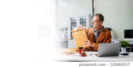Caucasian male judge in courtroom, lawyer working in office. Perfect for business, legal advice, corporate 129860057