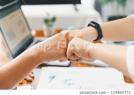 Teamwork meeting, business people in office workplace. Collaboration, technology and worker, employees with touchscreen planning sales, research or financial strategy, staff for conversation, graph 129860731