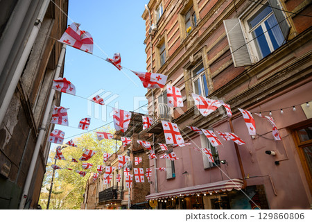 Street decorated with Georgian flags in Old Town in Tbilisi, Georgia 129860806