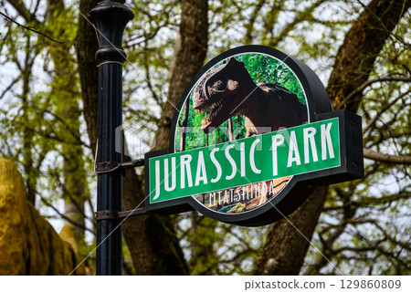 Jurassic Park Signpost with Dinosaur Logo Jurassic Park Signpost with Dinosaur Logo 129860809