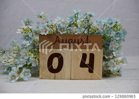 Wooden Calendar Showing the Date of August 4th. Day 4 of August month Wooden Calendar Showing the Date of August 4th. Day 4 of August month 129860965