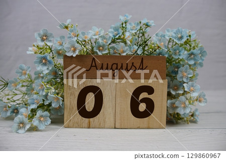 Wooden Calendar Showing the Date of August 6th. Day 6 of August month 129860967