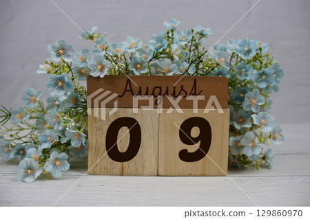 Wooden Calendar Showing the Date of August 9th. Day 9 of August month Wooden Calendar Showing the Date of August 9th. Day 9 of August month 129860970