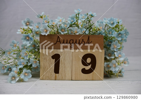 Wooden Calendar Showing the Date of August 19th. Day 19 of August month Wooden Calendar Showing the Date of August 19th. Day 19 of August month 129860980