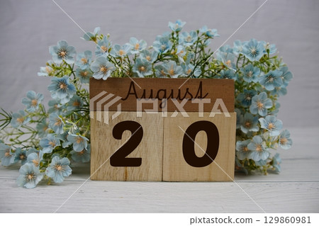 Wooden Calendar Showing the Date of August 20th. Day 20 of August month 129860981