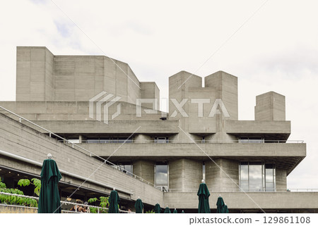 the National Theatre, a prominent cultural institution, The building is indeed known for its distinctive of Brutalist architecture. the National Theatre, a prominent cultural institution, The building is indeed known for its distinctive of Brutalist architecture. 129861108