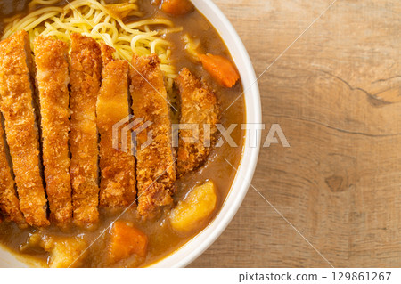 curry ramen noodles with tonkatsu fried pork cutlet curry ramen noodles with tonkatsu fried pork cutlet 129861267