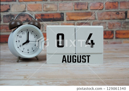 Wooden Calendar Showing the Date of August 4th. Day 4 of August month Wooden Calendar Showing the Date of August 4th. Day 4 of August month 129861340
