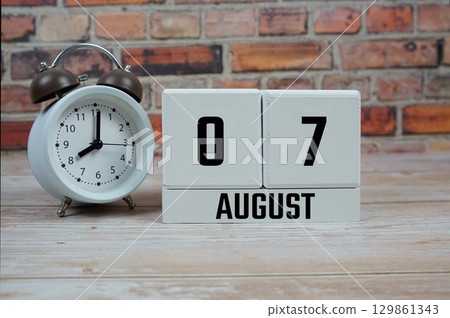 Wooden Calendar Showing the Date of August 7th. Day 7 of August month Wooden Calendar Showing the Date of August 7th. Day 7 of August month 129861343