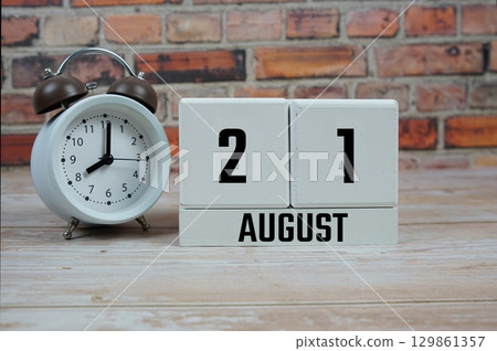 Wooden Calendar Showing the Date of August 21th. Day 21 of August month Wooden Calendar Showing the Date of August 21th. Day 21 of August month 129861357