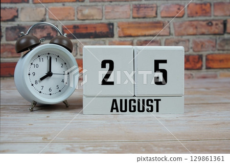 Wooden Calendar Showing the Date of August 25th. Day 25 of August month 129861361