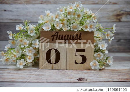 Wooden Calendar Showing the Date of August 5th. Day 5 of August month 129861403